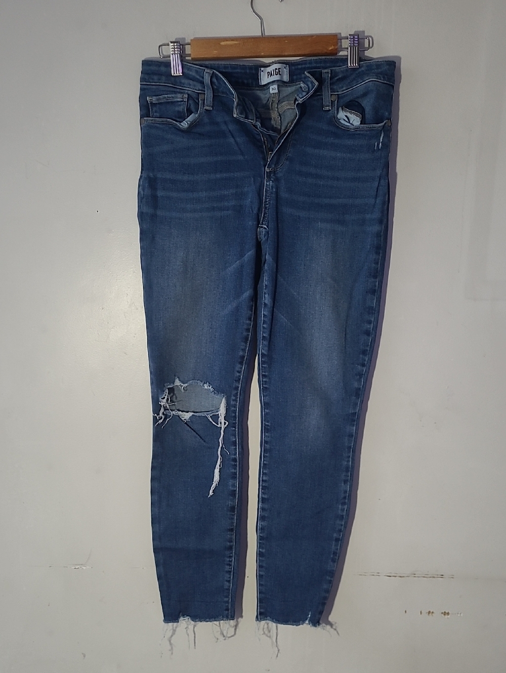 PAIGE Blue Skinny Jeans with Distressed Knee and Raw Hem